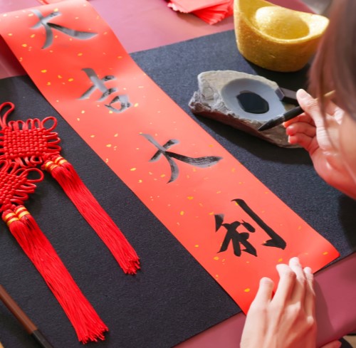 Couplets writing workshop for employees to design their own couplets for Chinese New Year